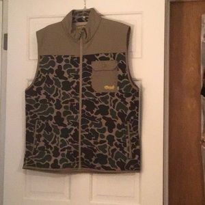 Greens & Browns on this sleeveless shirt.